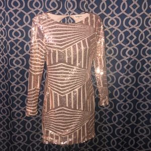 Pretty dress, stunning in the light. Great detail.